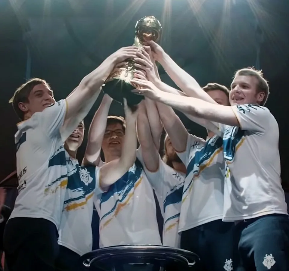 MSI trophy celebration G2 Esports lifting the Mid-Season Invitational trophy on stage