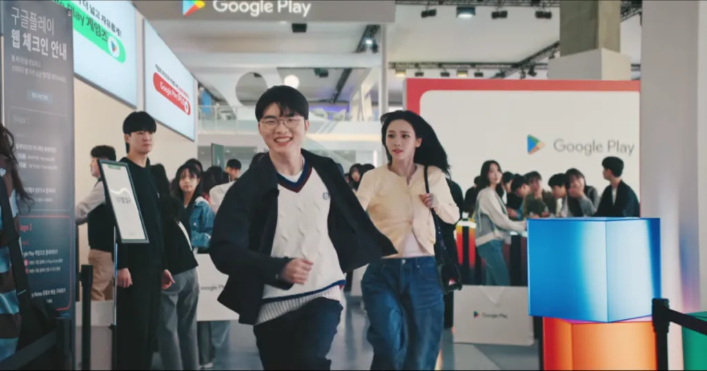Faker running holding Karina in the Faker and Karina Google Play Ad collaboration Faker running holding Karina in the Faker and Karina Google Play Ad collaboration