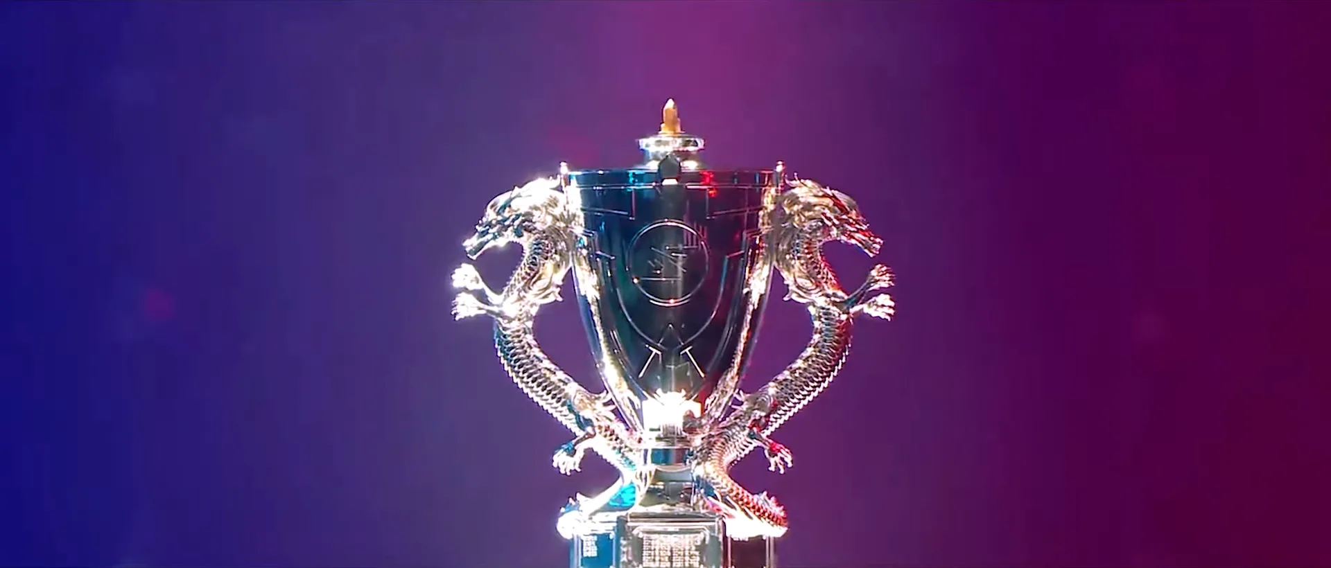 Silver LPL trophy on a purple and blue stage Silver LPL trophy on a purple and blue stage