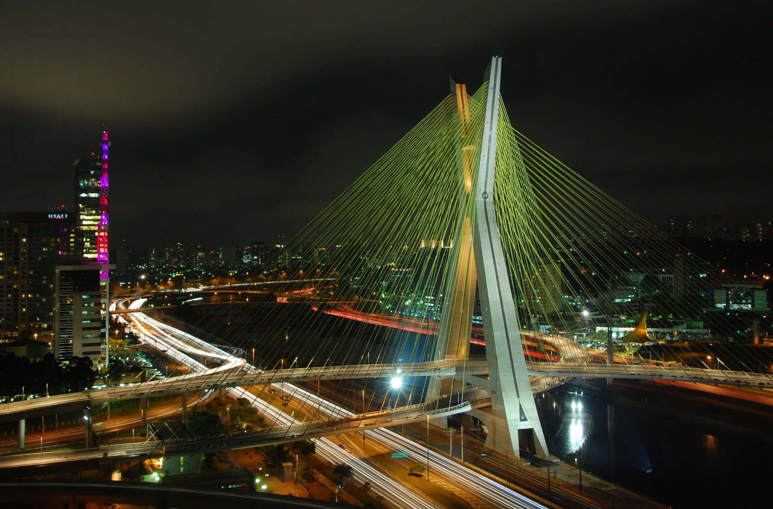 Illuminated São Paulo cable-stayed bridge and city skyline at night Illuminated São Paulo cable-stayed bridge and city skyline at night