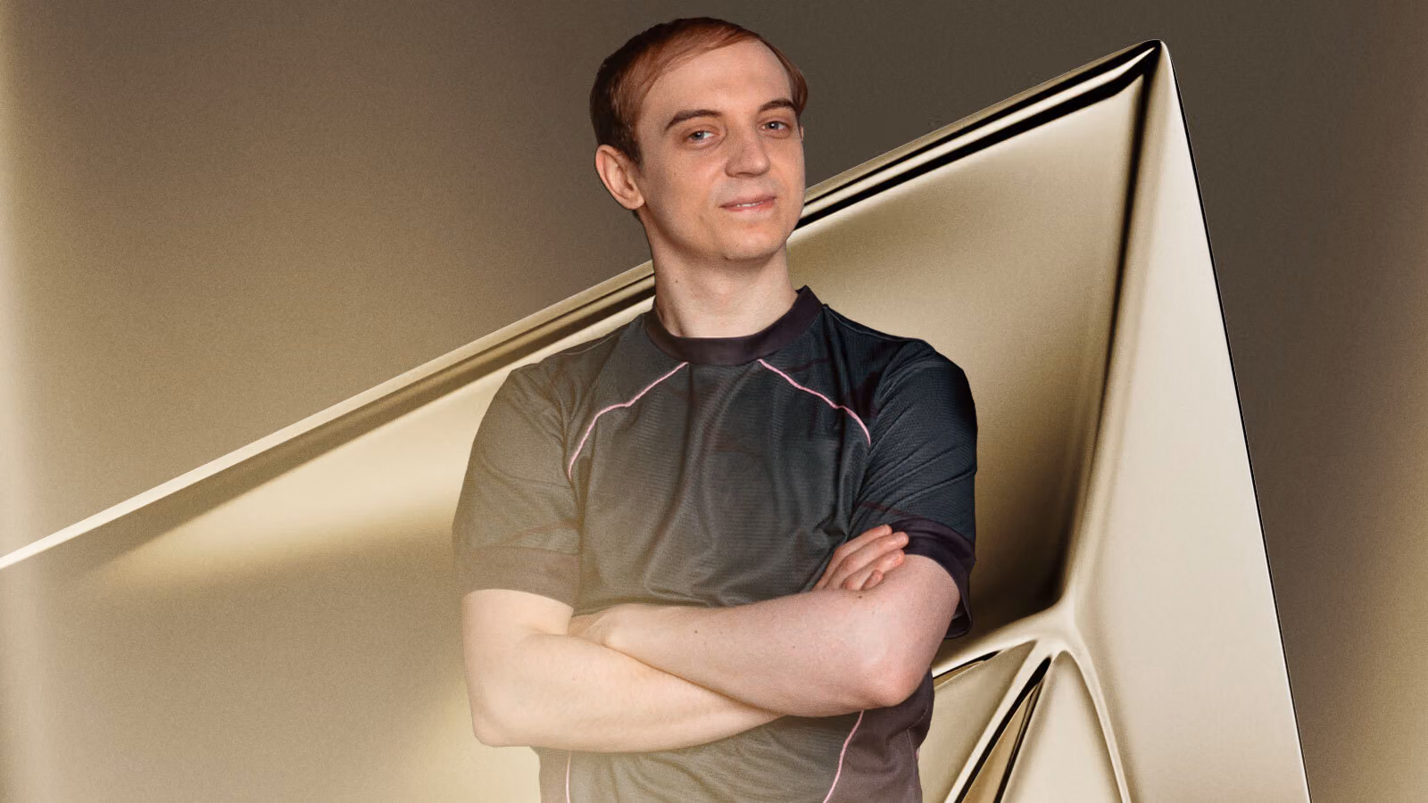 Pro League of Legends player standing with arms crossed Pro League of Legends player standing with arms crossed