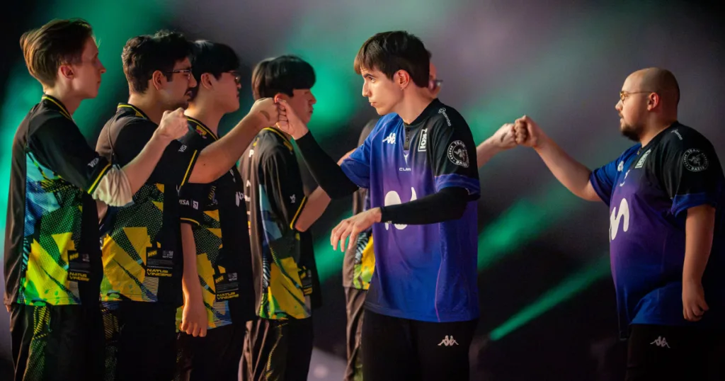 Elyoya and Myrwn giving bro-fists to NAVI players after winning against them in LEC summer Playoffs. Elyoya and Myrwn giving bro-fists to NAVI players after winning against them in LEC summer Playoffs.