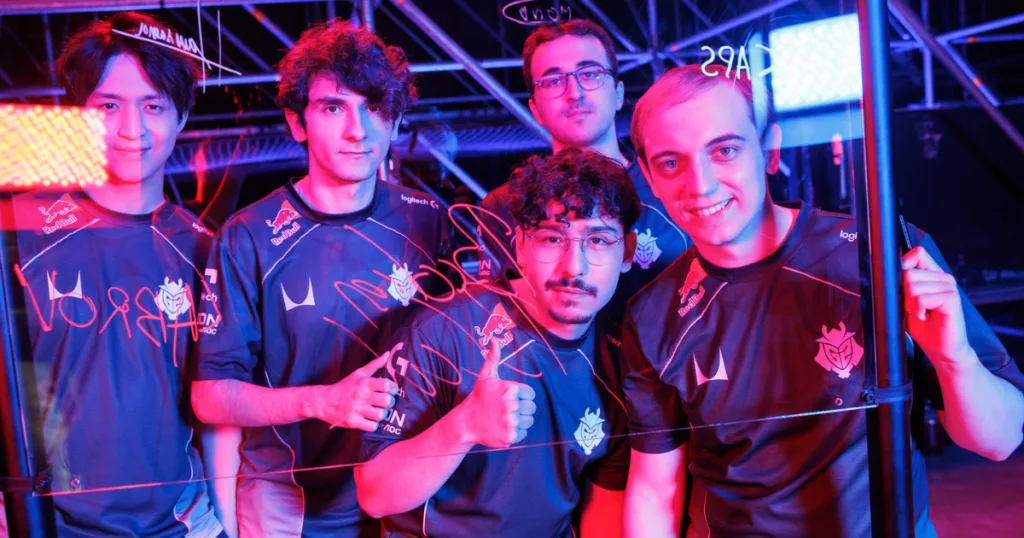 G2 posing at autograph wall at MSI. G2 posing at autograph wall at MSI.
