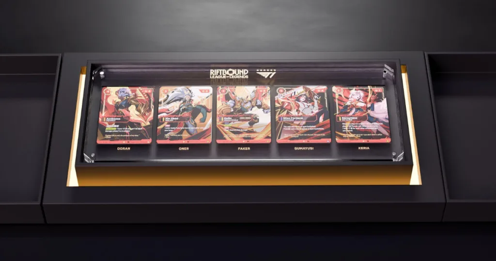T1 x Riftbound cards in a glass case. T1 x Riftbound cards in a glass case.